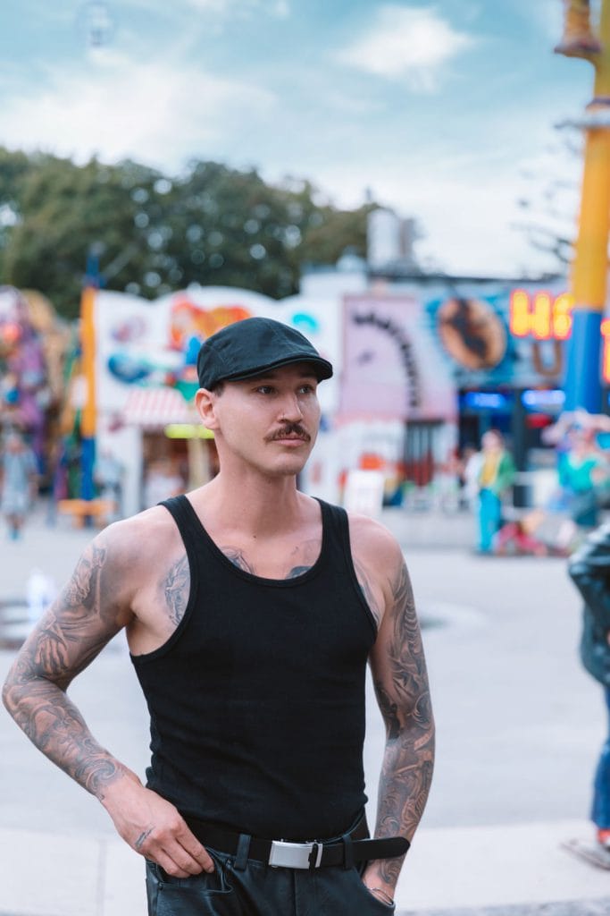 Youthful sophistication: A stylish urbanite adds a flat cap to his look