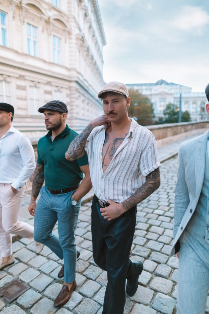 Urban chic: A young man adds a modern twist to his style with a flat cap