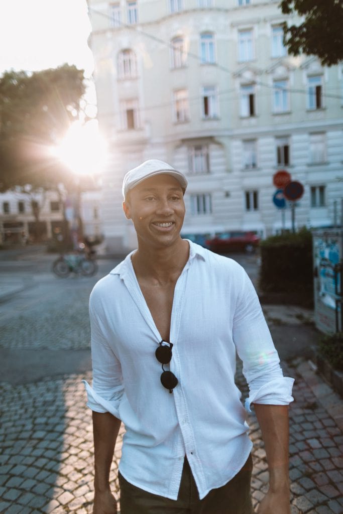 Vintage-inspired headwear completes a gentleman's sophisticated ensemble