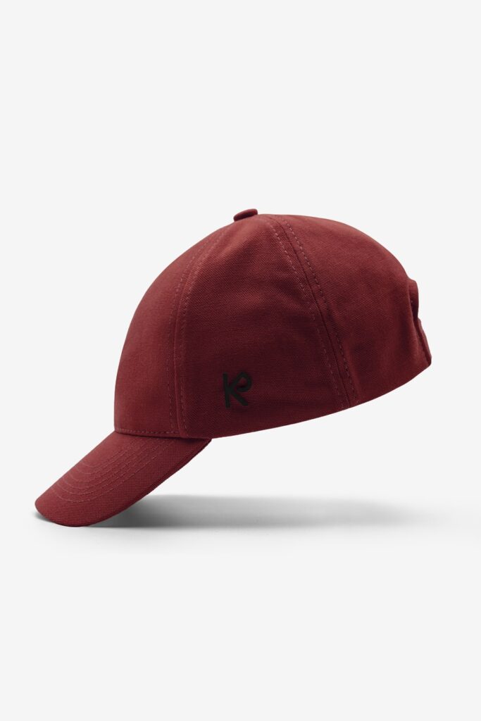 A red Baseball Cap from the side
